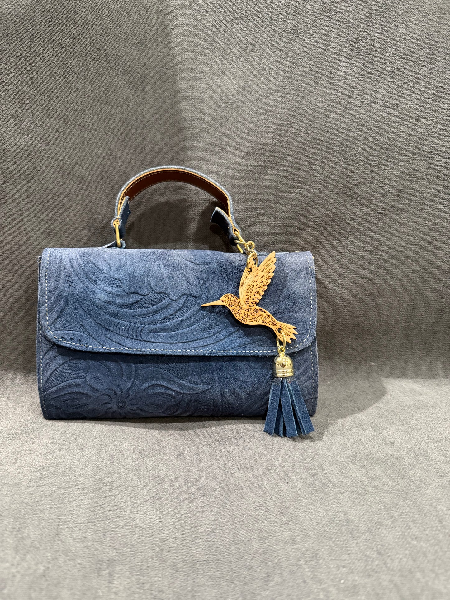 Blue Embossed Handbag with Hummingbird Charm